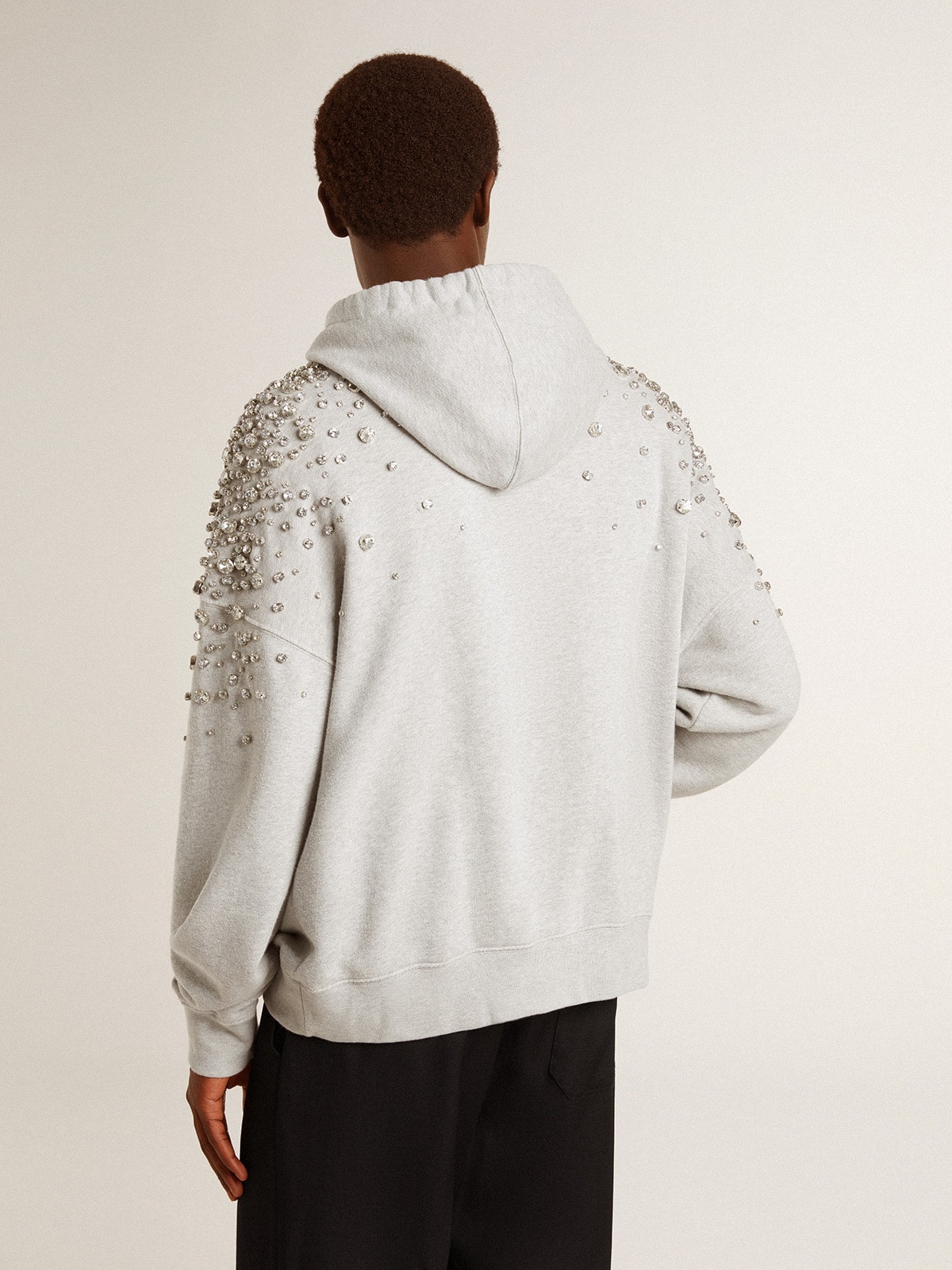 Gray hooded sweatshirt with crystal decoration