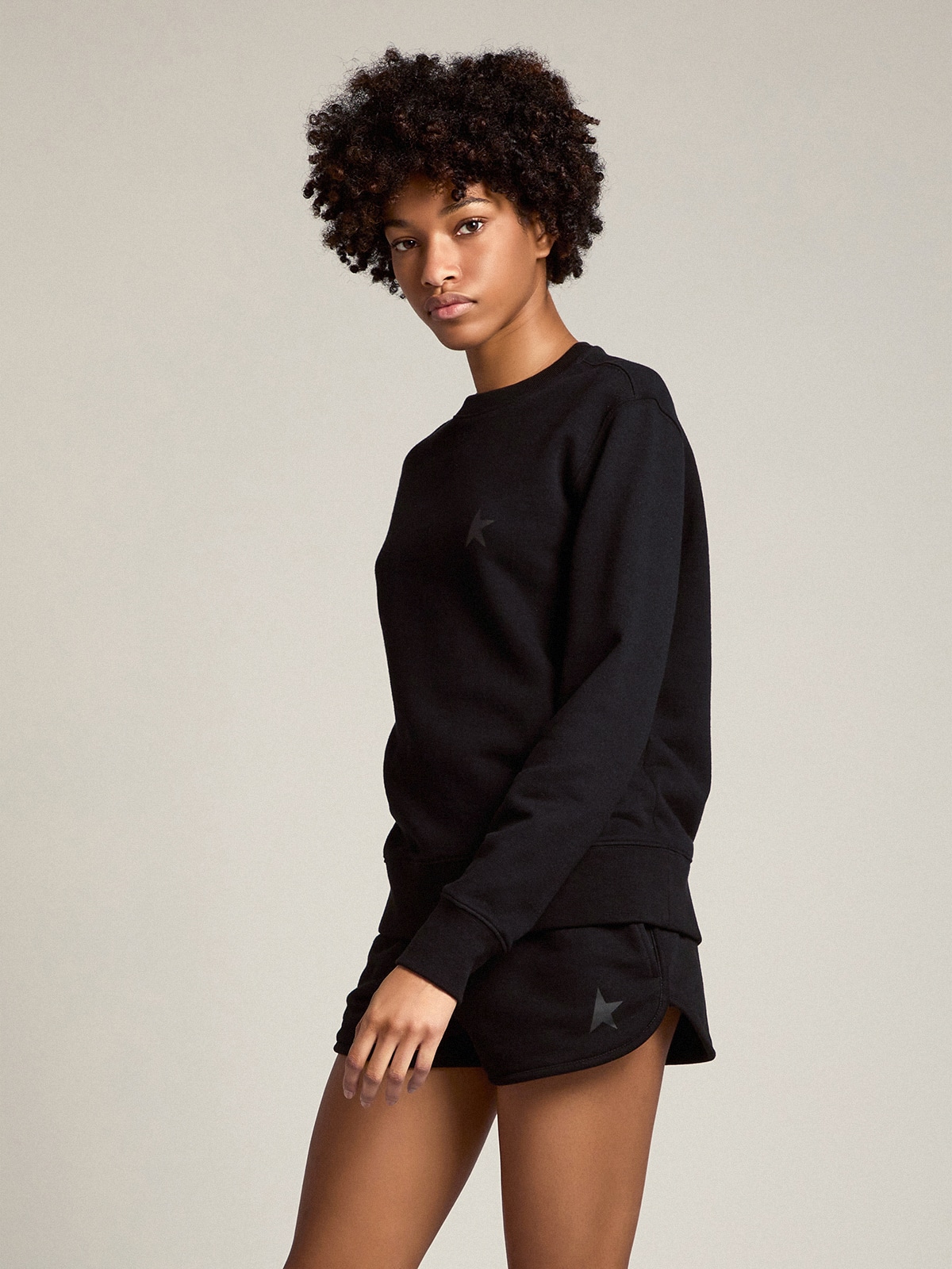 Women's black shorts with tone-on-tone star