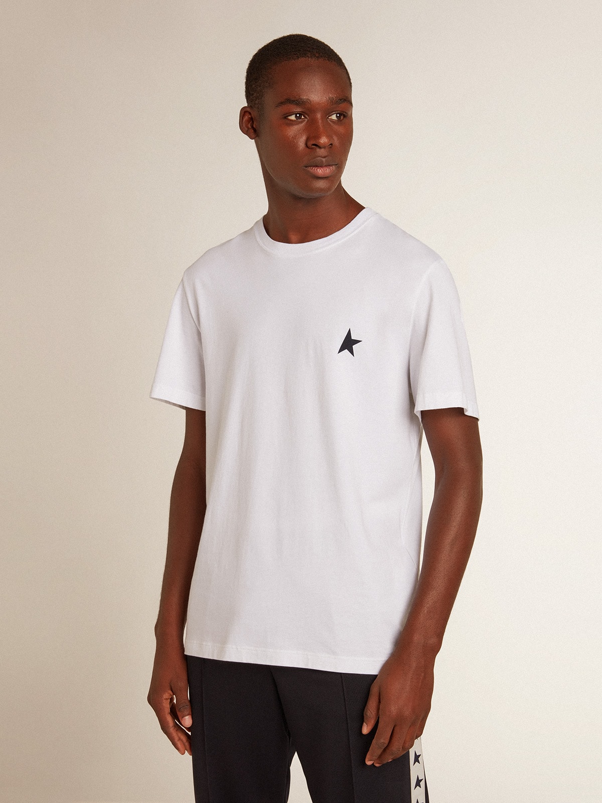 Men’s white T-shirt with dark blue star on the front