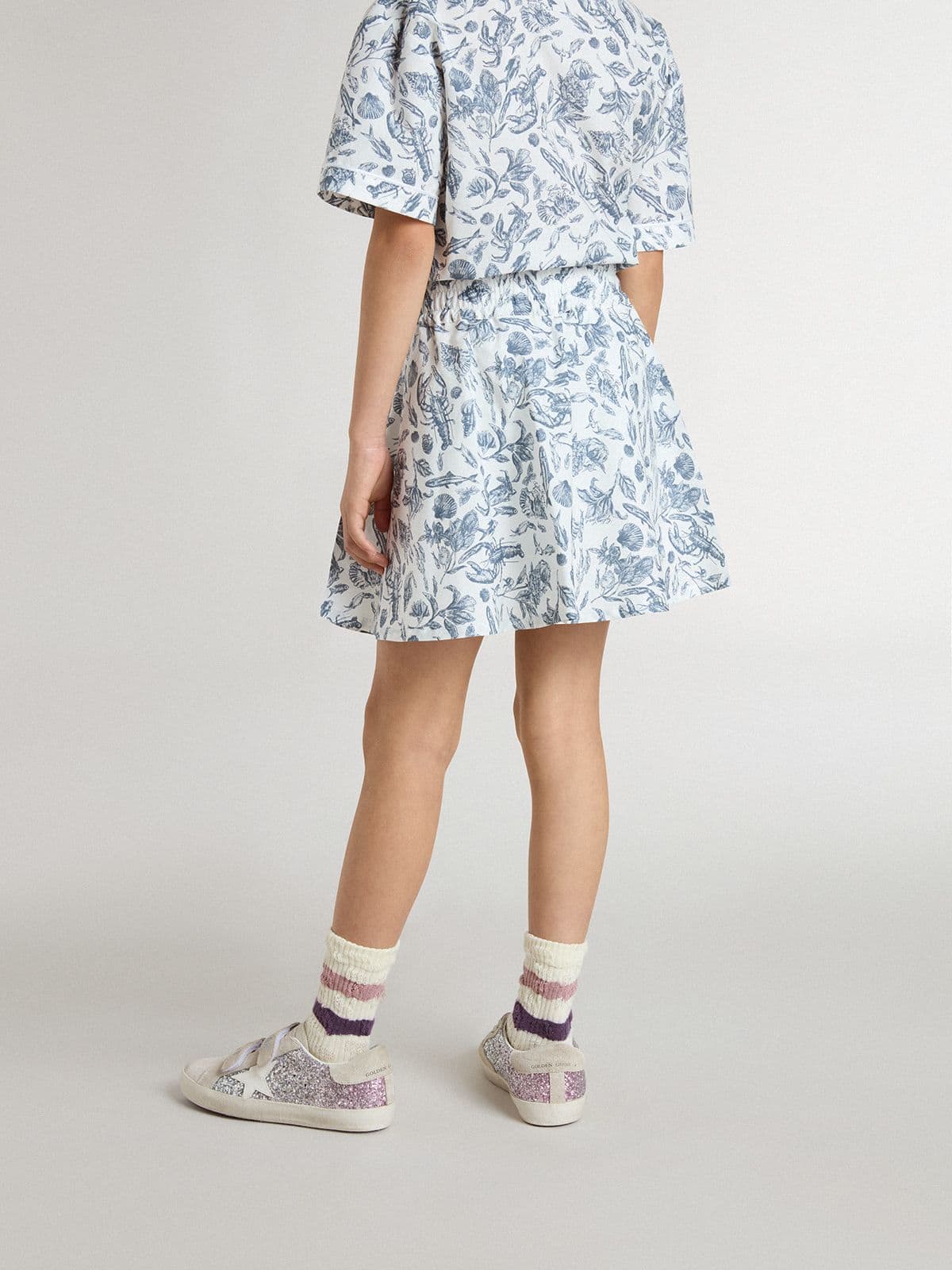 Girls’ white skirt with blue print