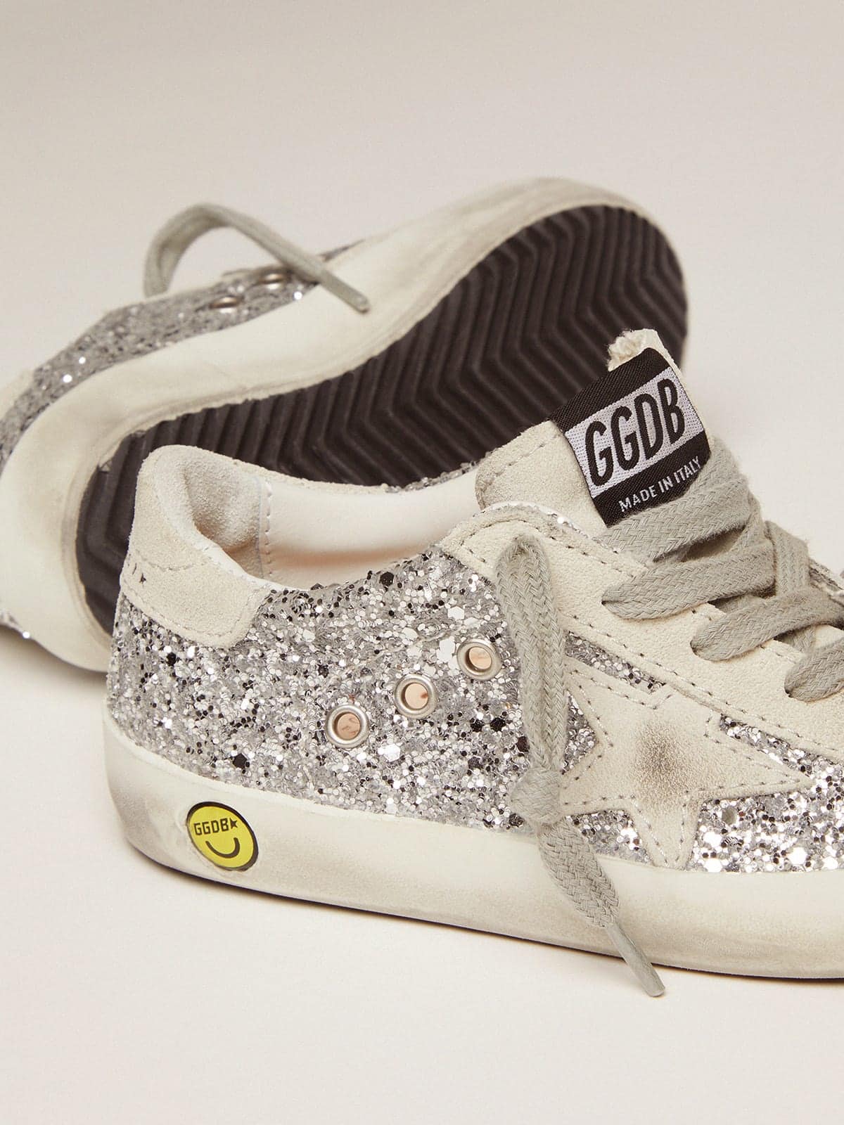 Junior Super-Star in silver glitter with ice-gray suede star