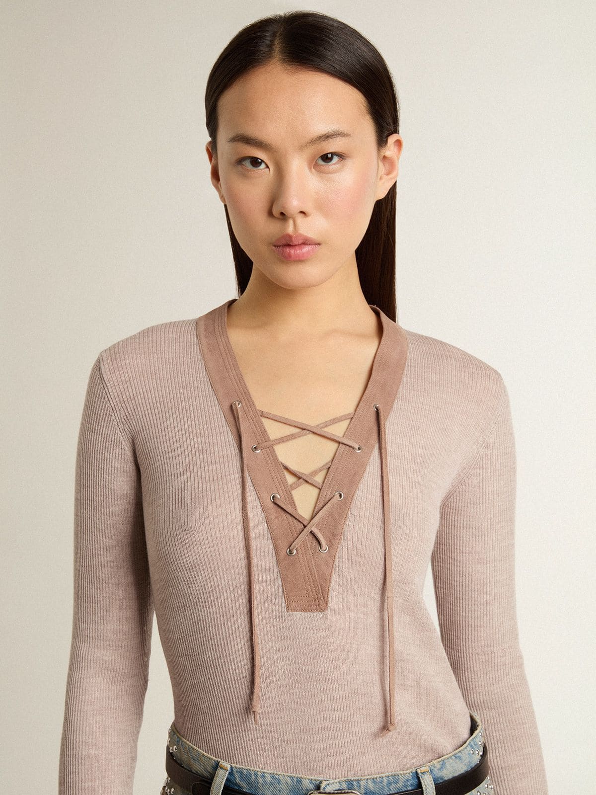 Beige wool sweater with leather details