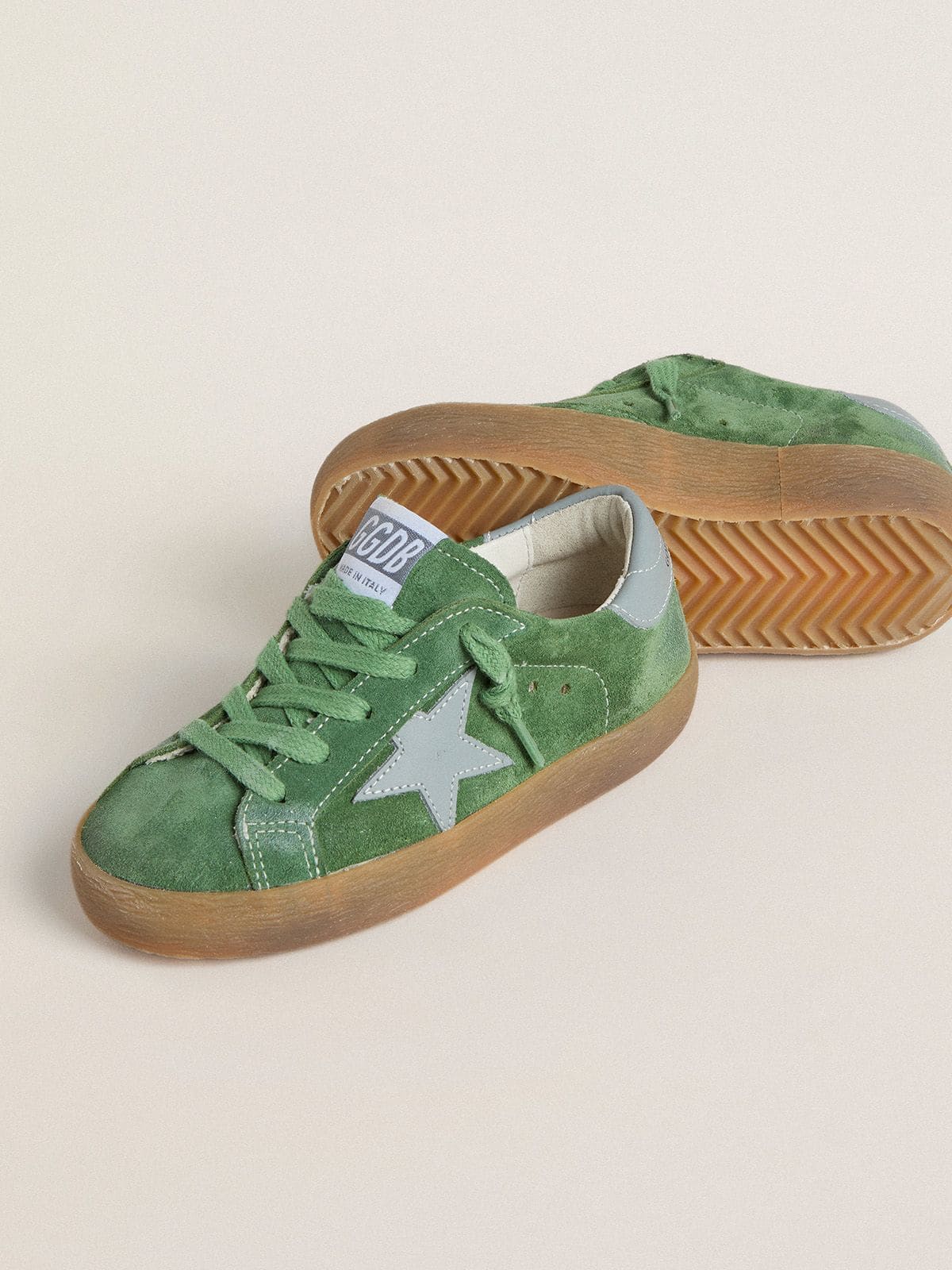 Young Super-Star in green suede with baby blue star and heel tab