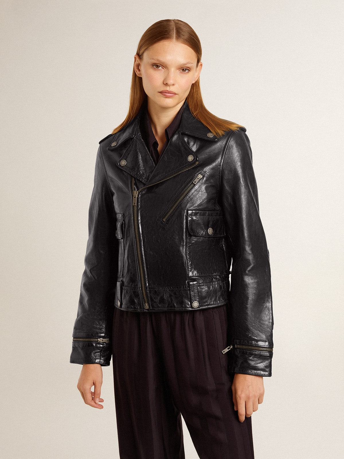 Women’s black leather biker jacket with glossy effect