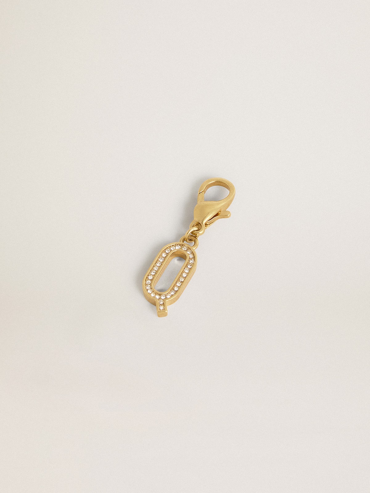 Letter Q charm in gold-colored brass with crystals