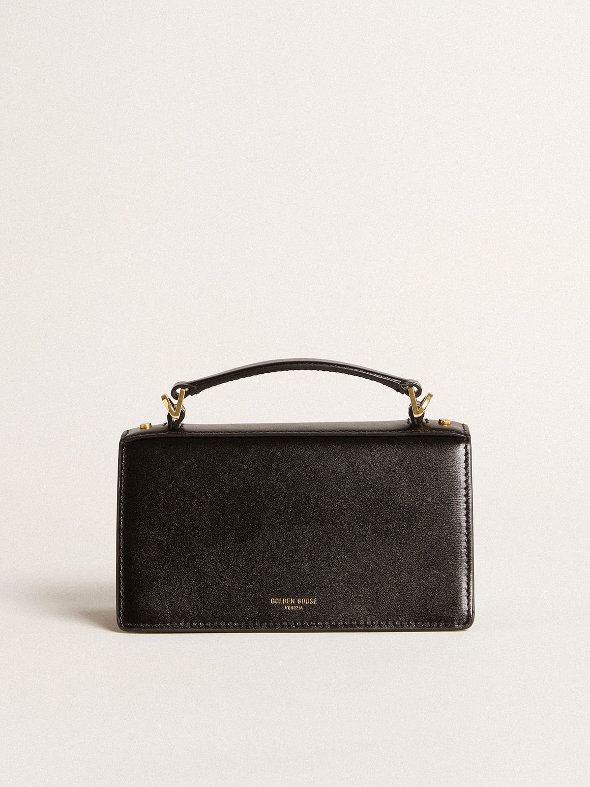 Small Venezia Bag in black boarded leather with gold details