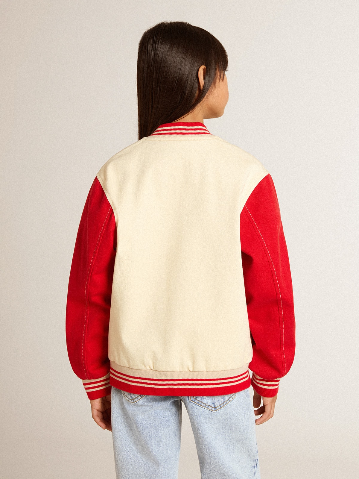 Kids' bomber jacket in beige and red cotton with embroidery on the chest