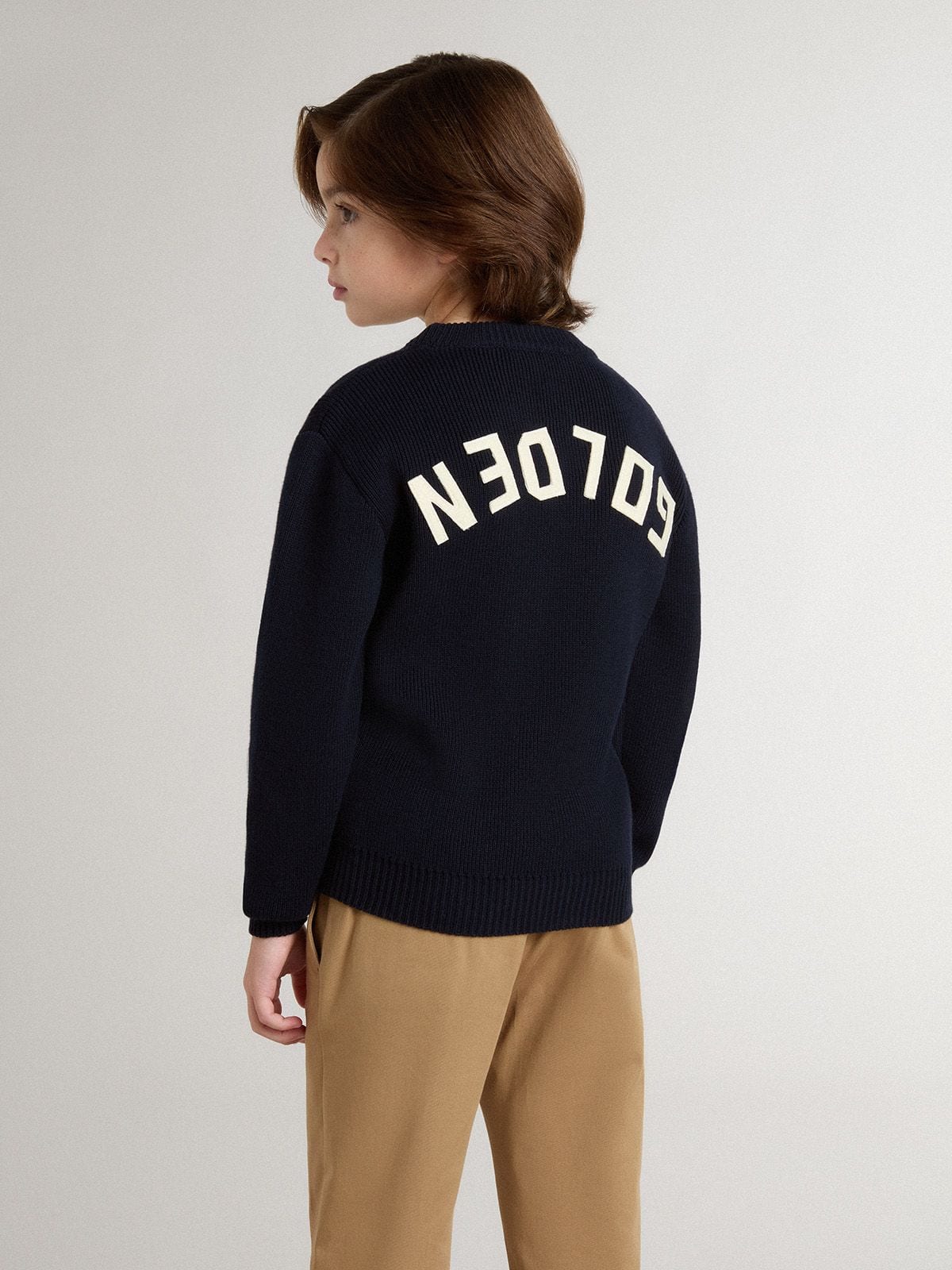 Boys’ blue crew-neck sweater with 'Golden' lettering on the back