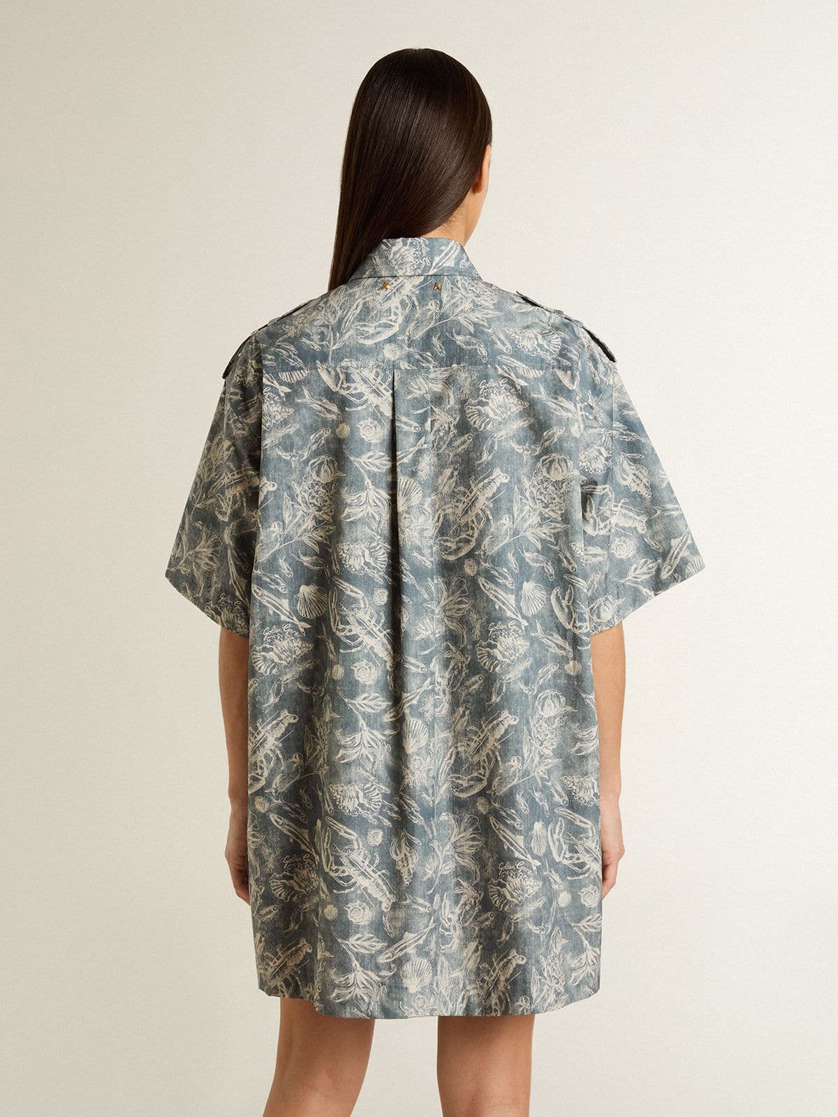 Women's short shirt dress in light blue cotton poplin with all-over marine print