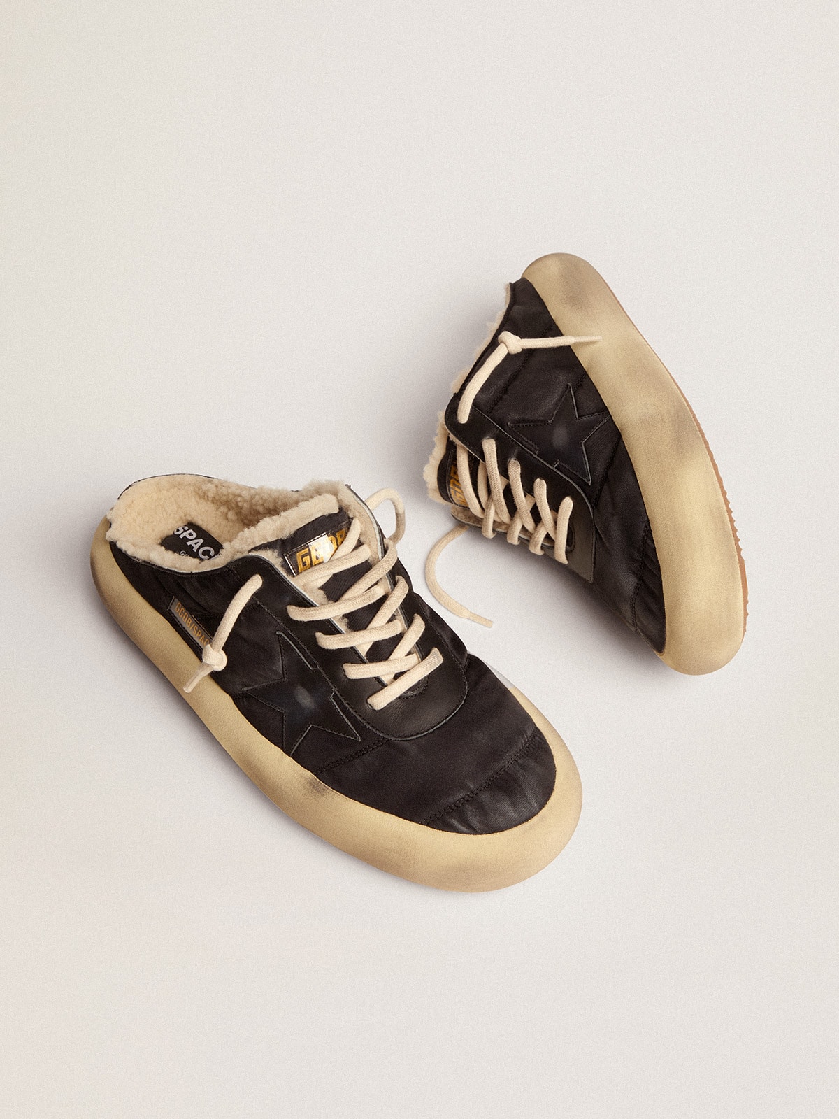 Men's Space-Star Sabot shoes in quilted black nylon with shearling lining