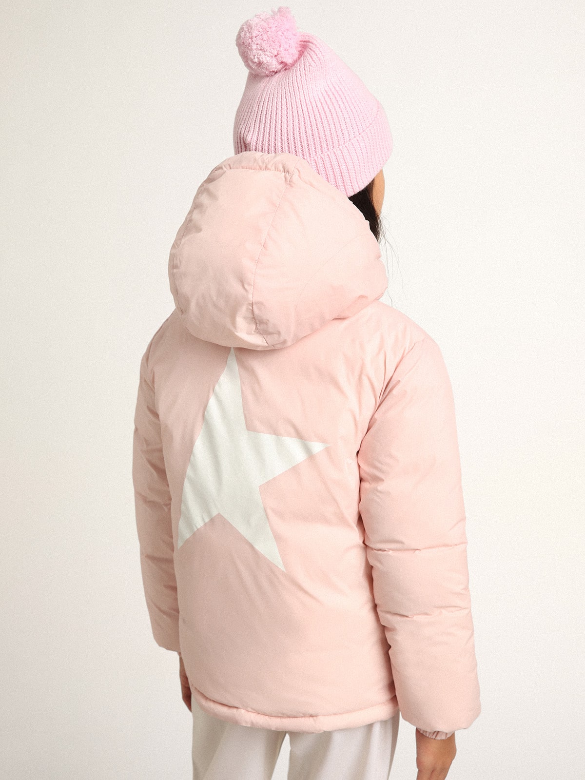 Pink padded jacket with hood and white maxi star on the back