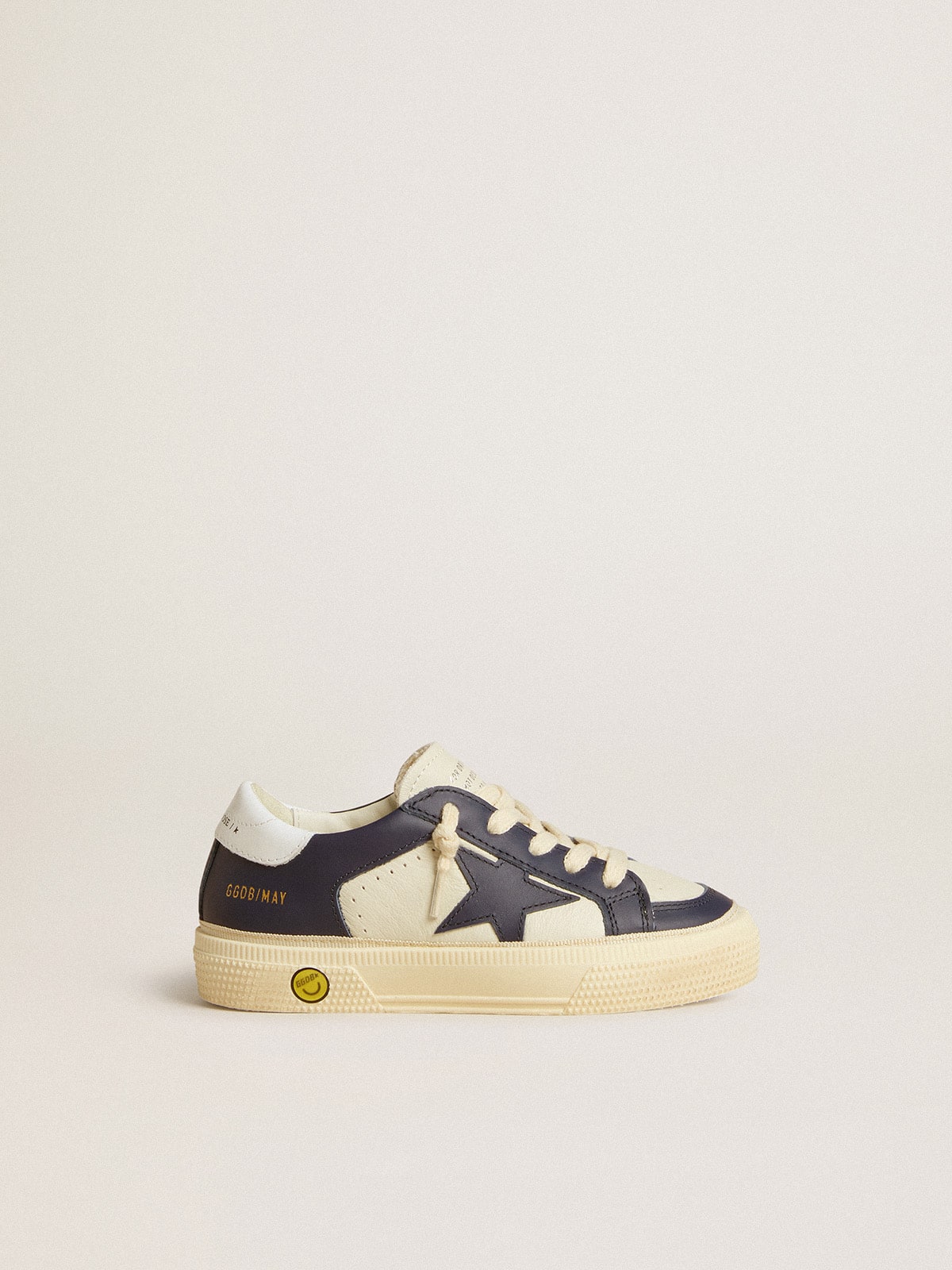 Young May in white and blue leather with leather star and heel tab