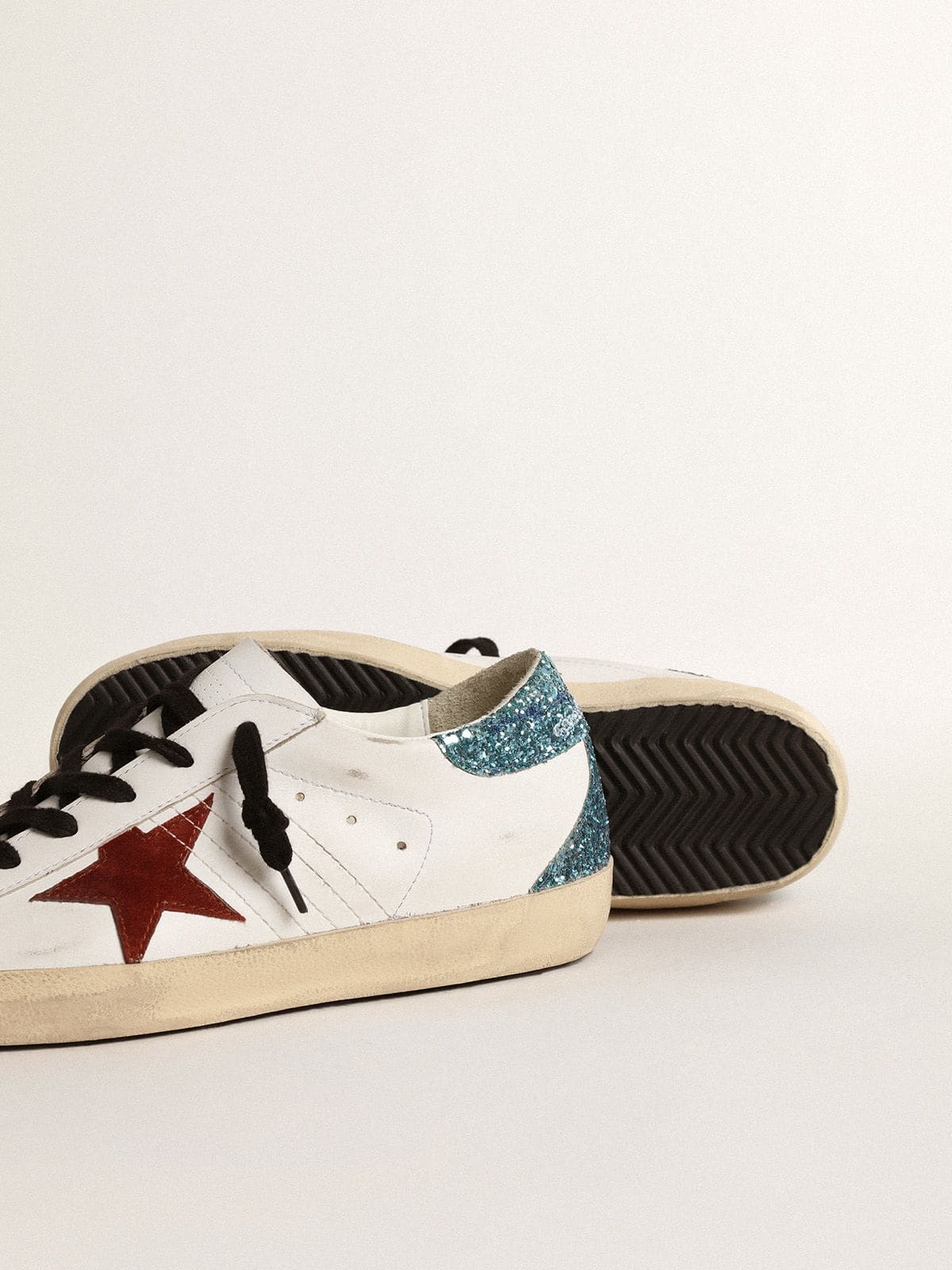 Women’s Super-Star with burgundy suede star and light blue glitter heel tab