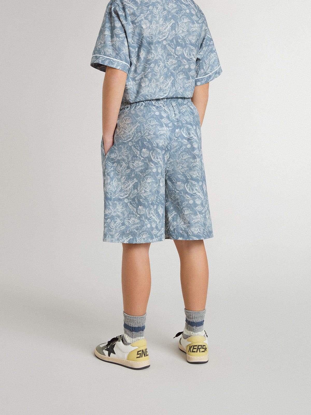 Boys’ blue shorts with white print