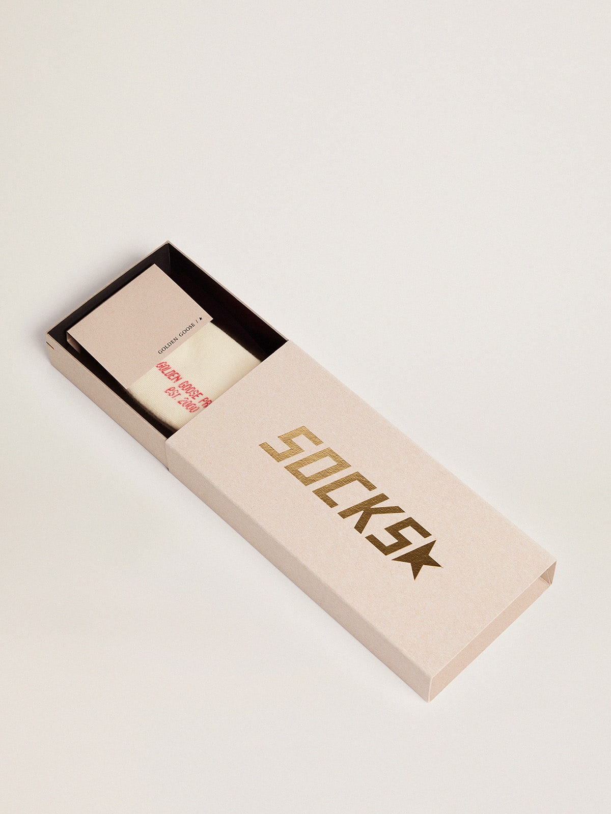 Distressed-finish white socks with green and orange stripes