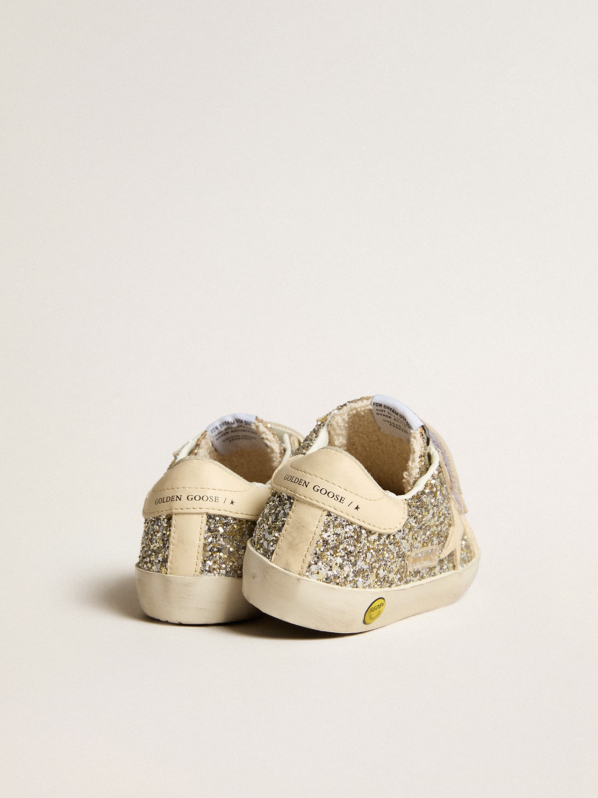 Junior Old School in platinum glitter with leather star and heel tab