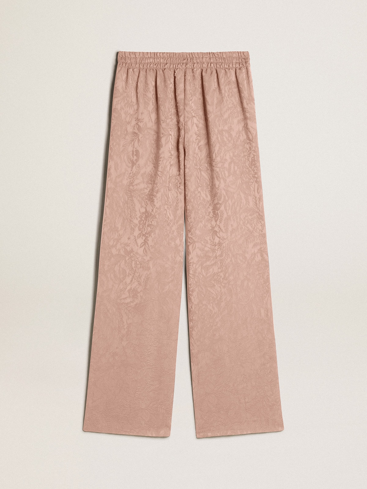 Women's pink viscose pants with floral pattern
