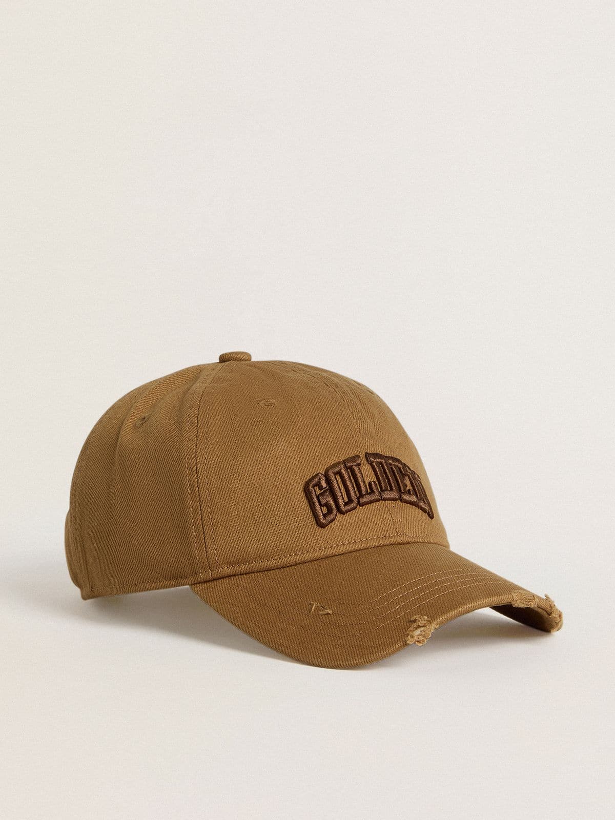 Beige cotton baseball cap with a lived-in finish