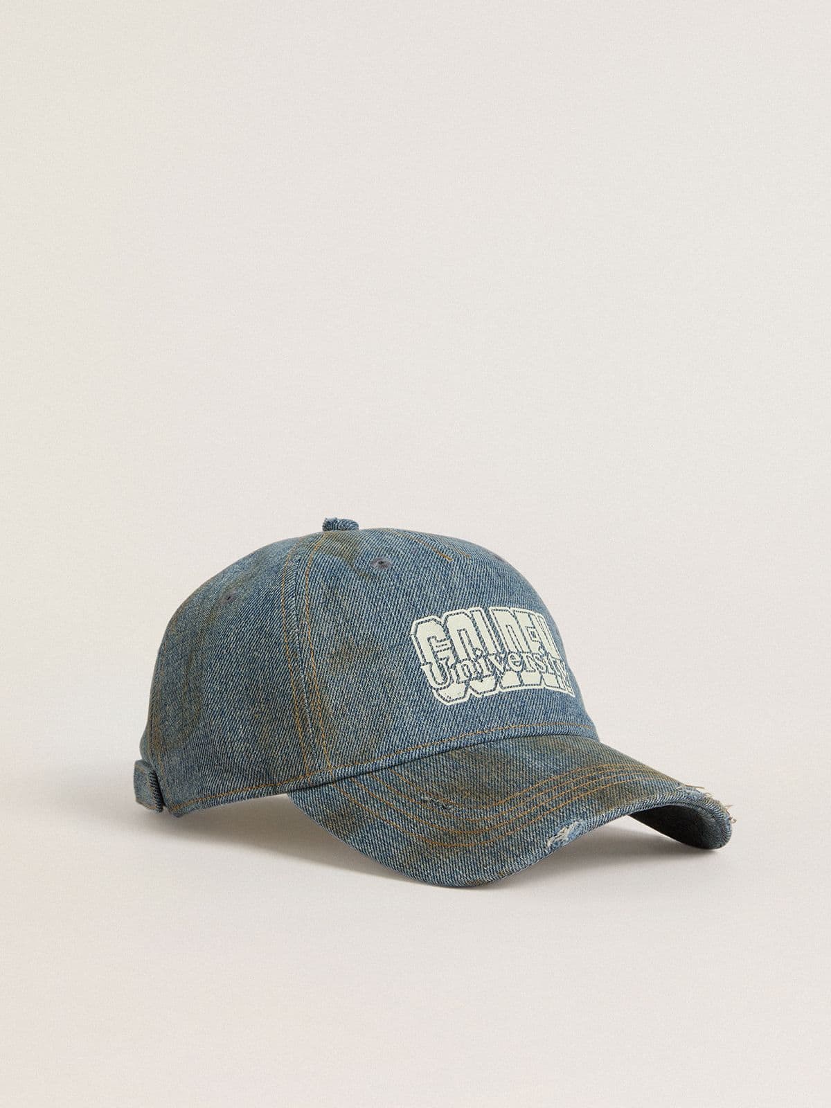Denim-colored cotton baseball cap with a lived-in finish