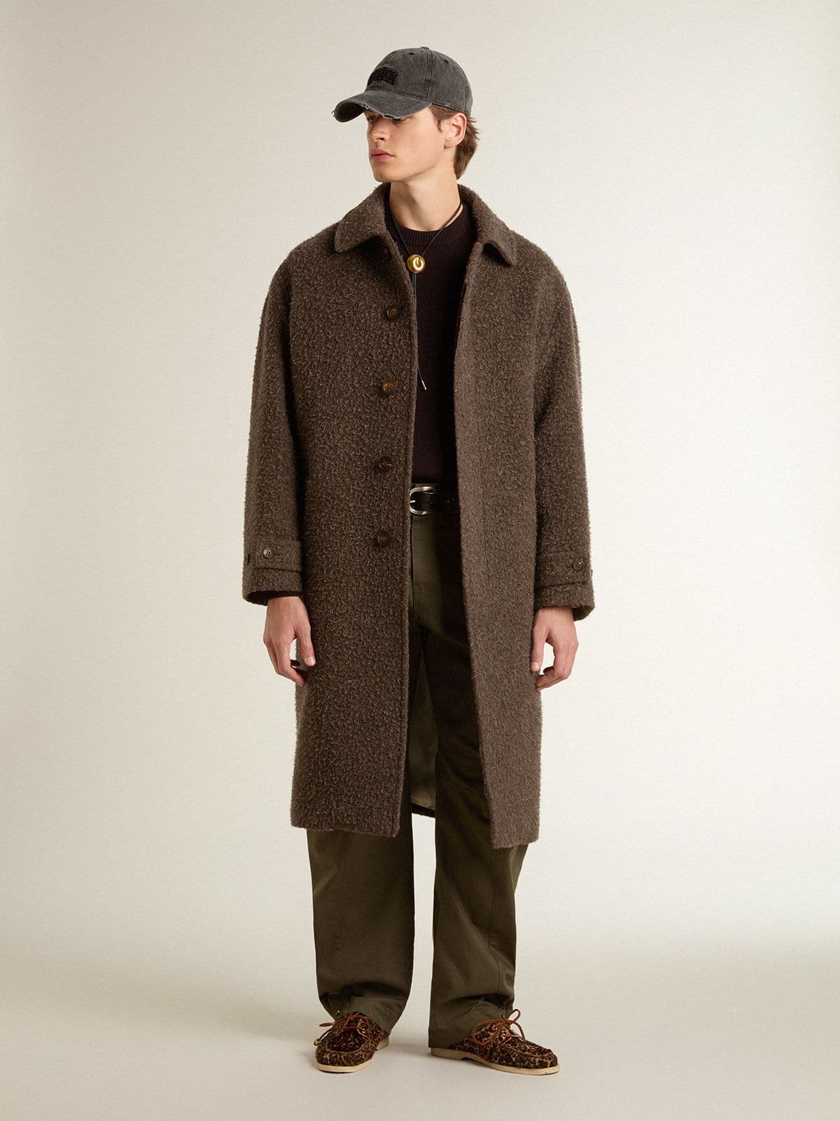 Men's brown crew-neck sweater with 'Golden' lettering on the back