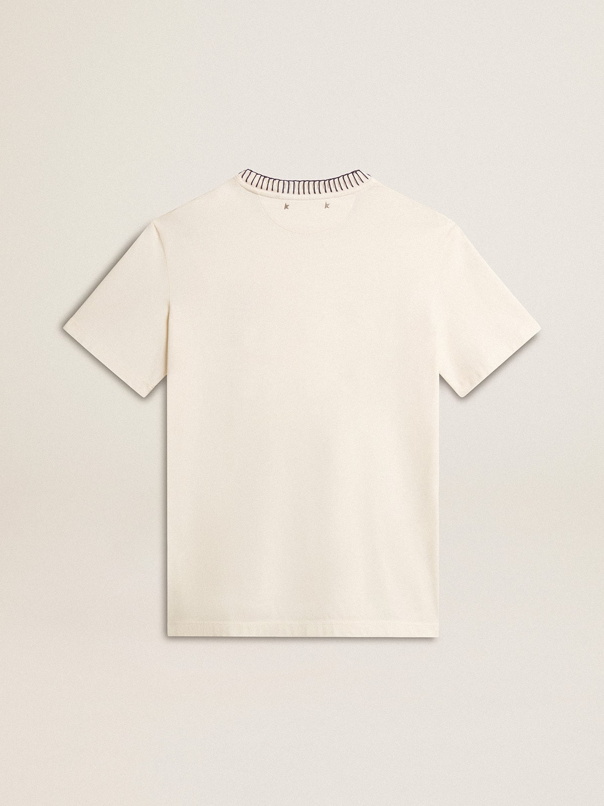 Women's aged white cotton T-shirt with hand embroidery