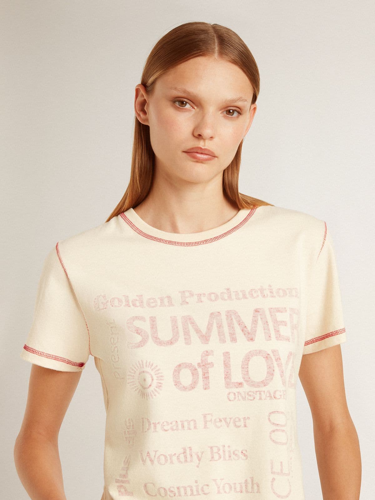 Women's cream T-shirt with faded red accents