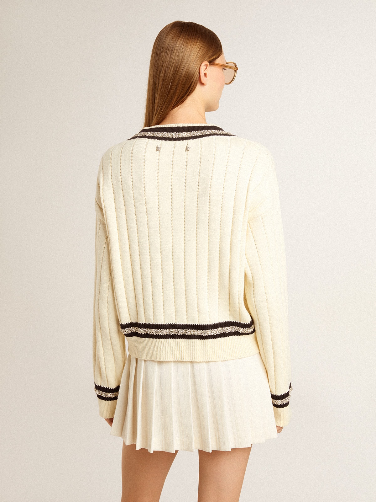 Women's cable-pattern cropped sweater with blue ribbing and crystals