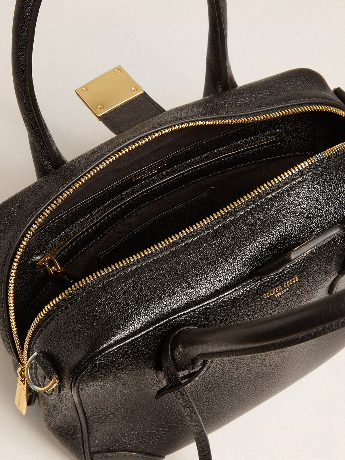 Vita Bag in black sheepskin leather with gold details