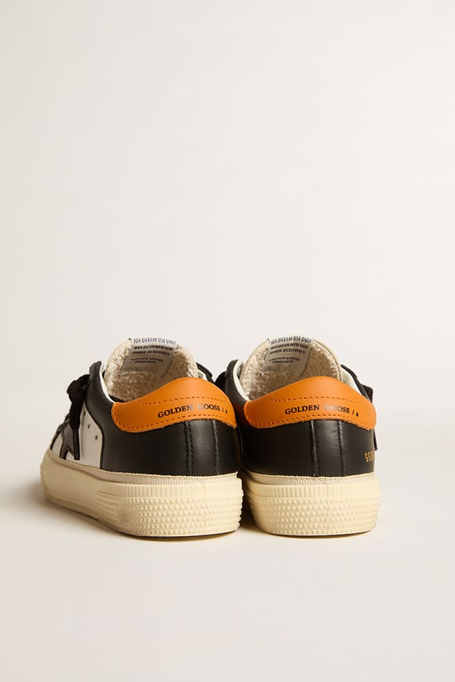 May Teen in black and white leather with black star and orange heel tab