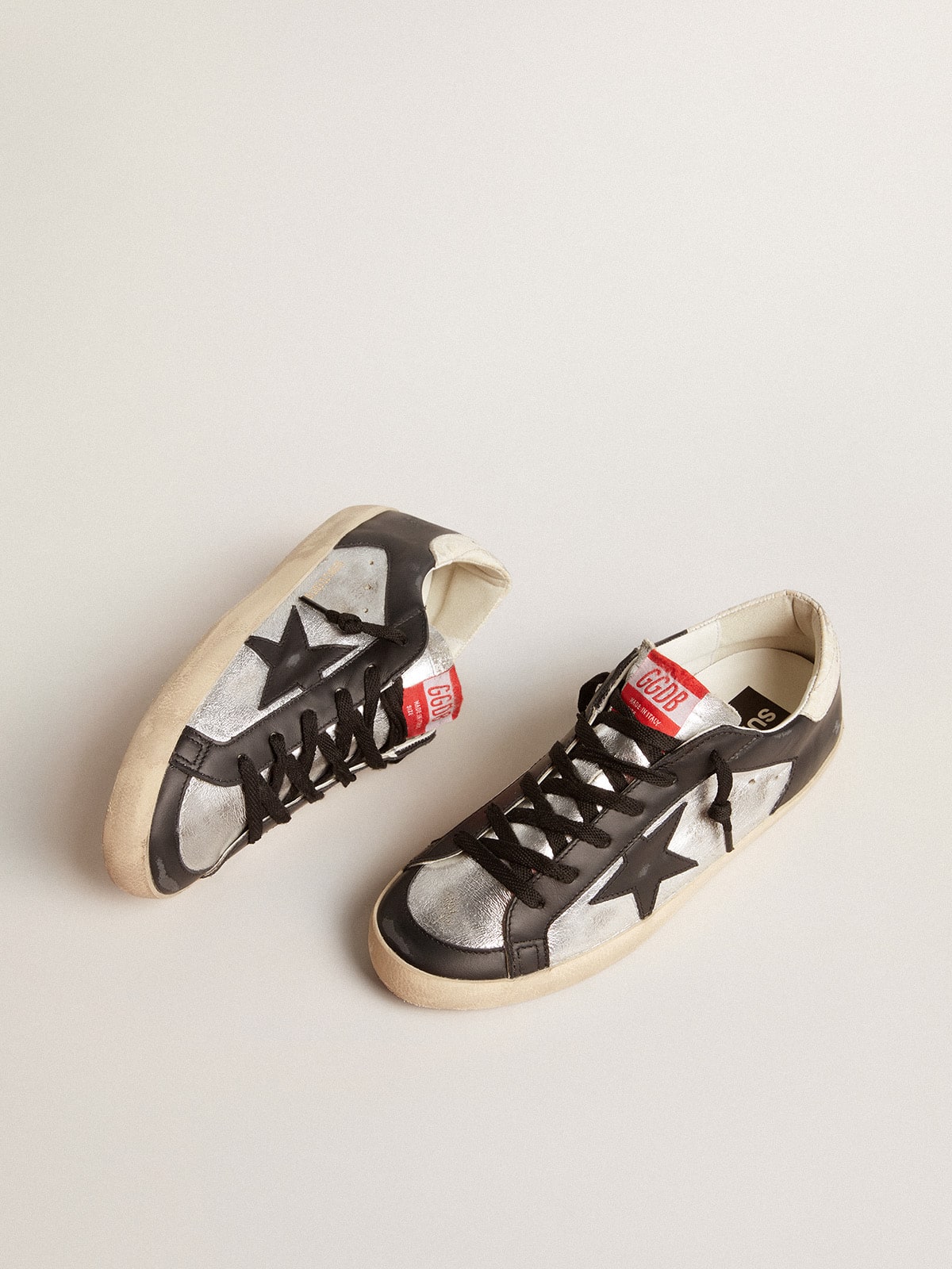 Super-Star LTD in metallic leather with black leather star and inserts
