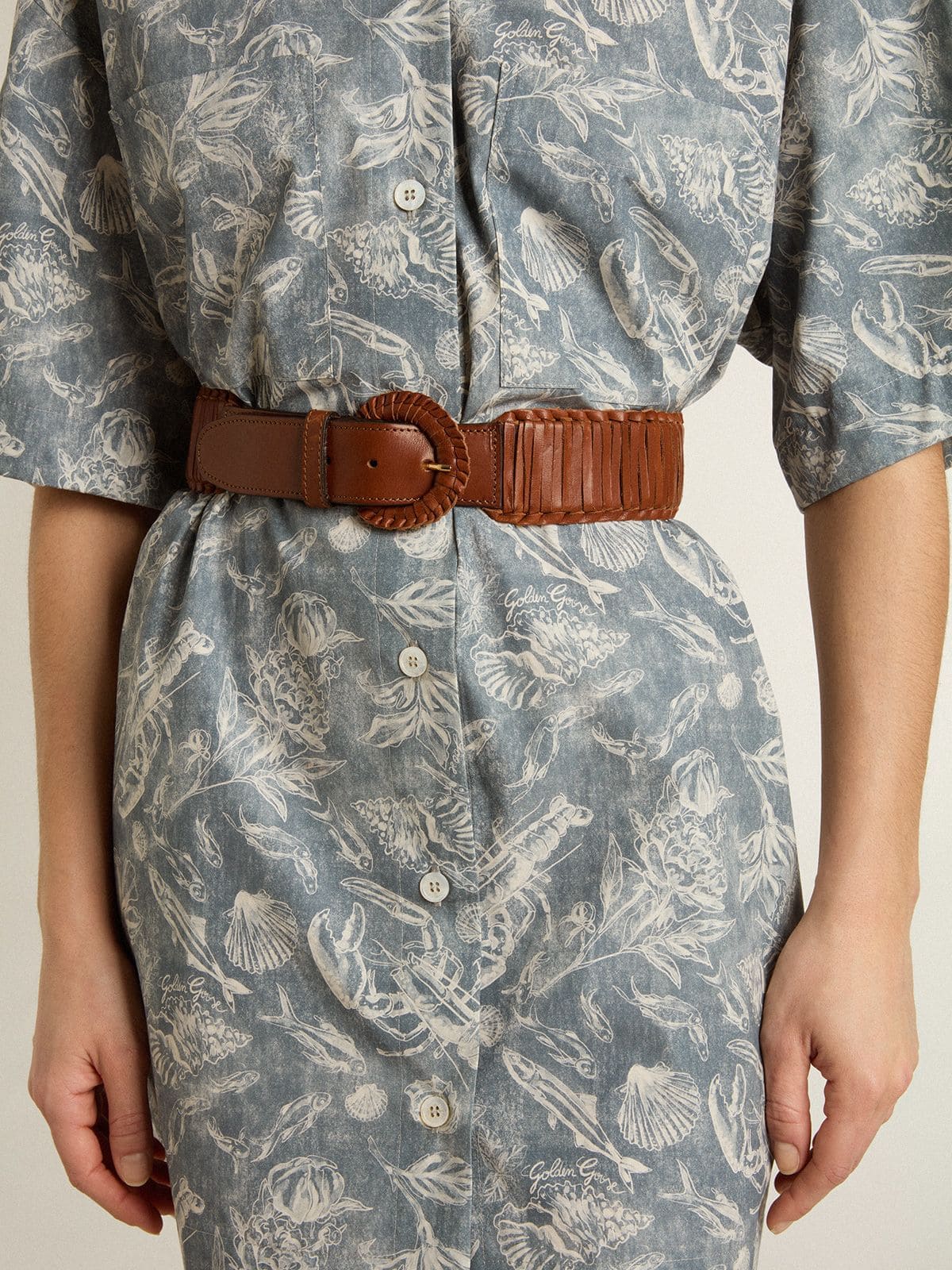 Women's belt in woven brown leather