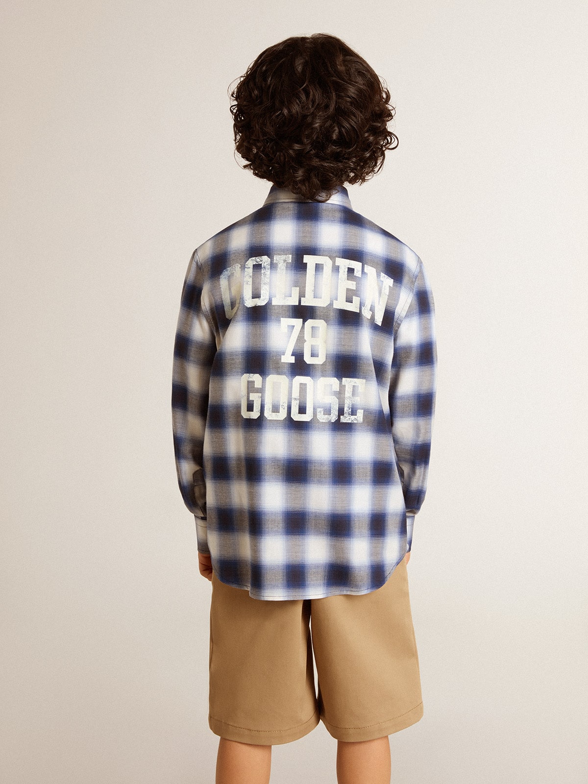 Boys' blue and white checked shirt with print on the back