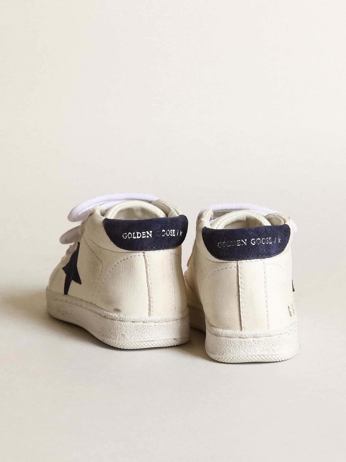 Junior June in nappa with dark blue suede star and heel tab