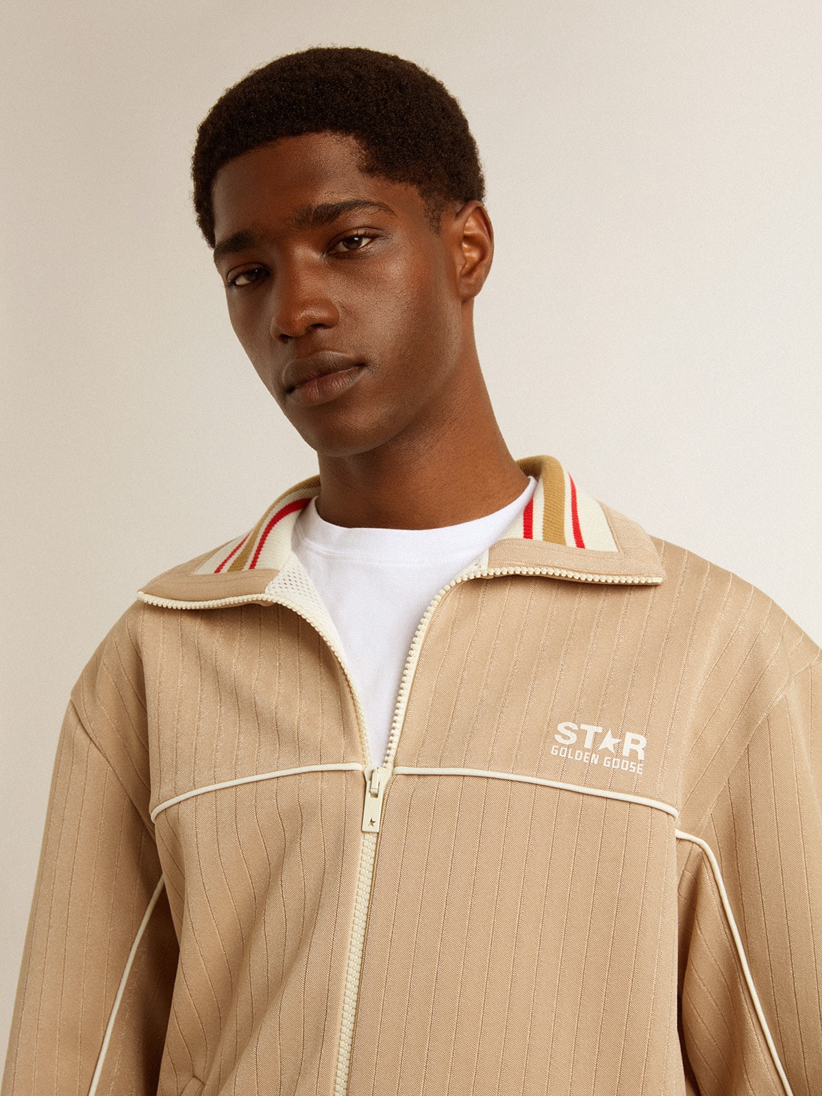 Men’s light beige zipped sweatshirt with white logo