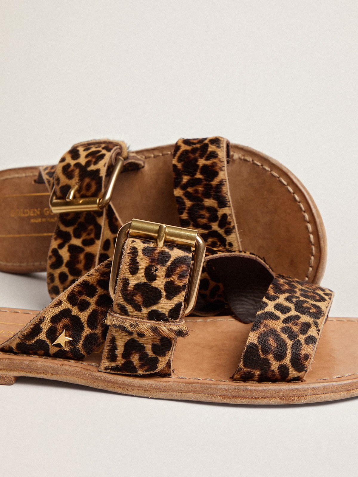 Women's Margaret flat sandals in leopard-print pony skin