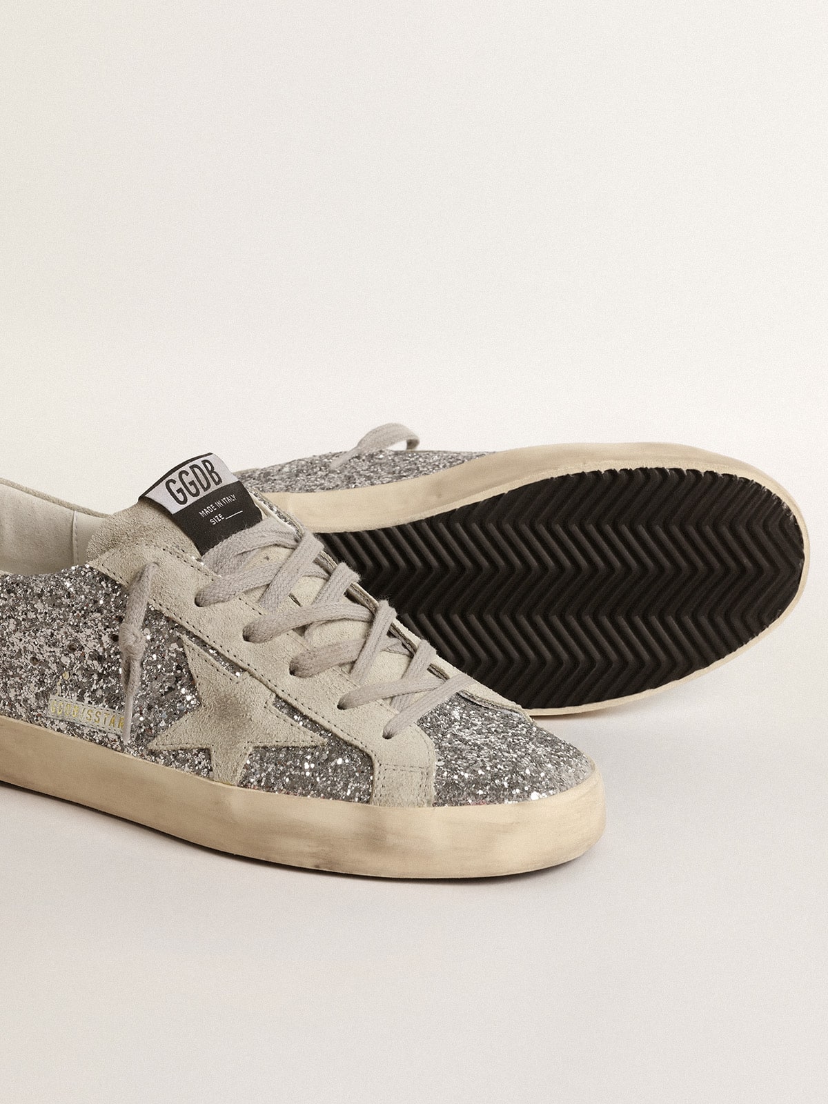 Women's Super-Star in silver glitter with ice-gray suede star