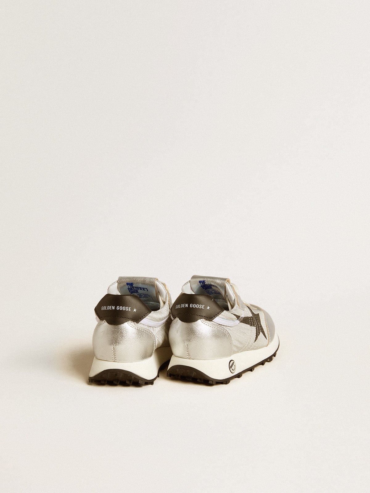 Young Marathon in silver nylon with black star and leather heel tab