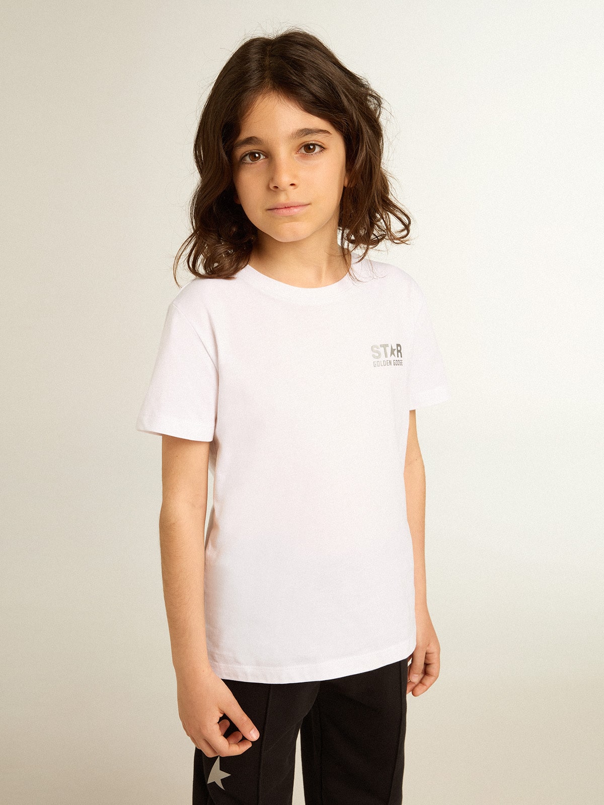 White T-shirt with contrasting silver logo on the front