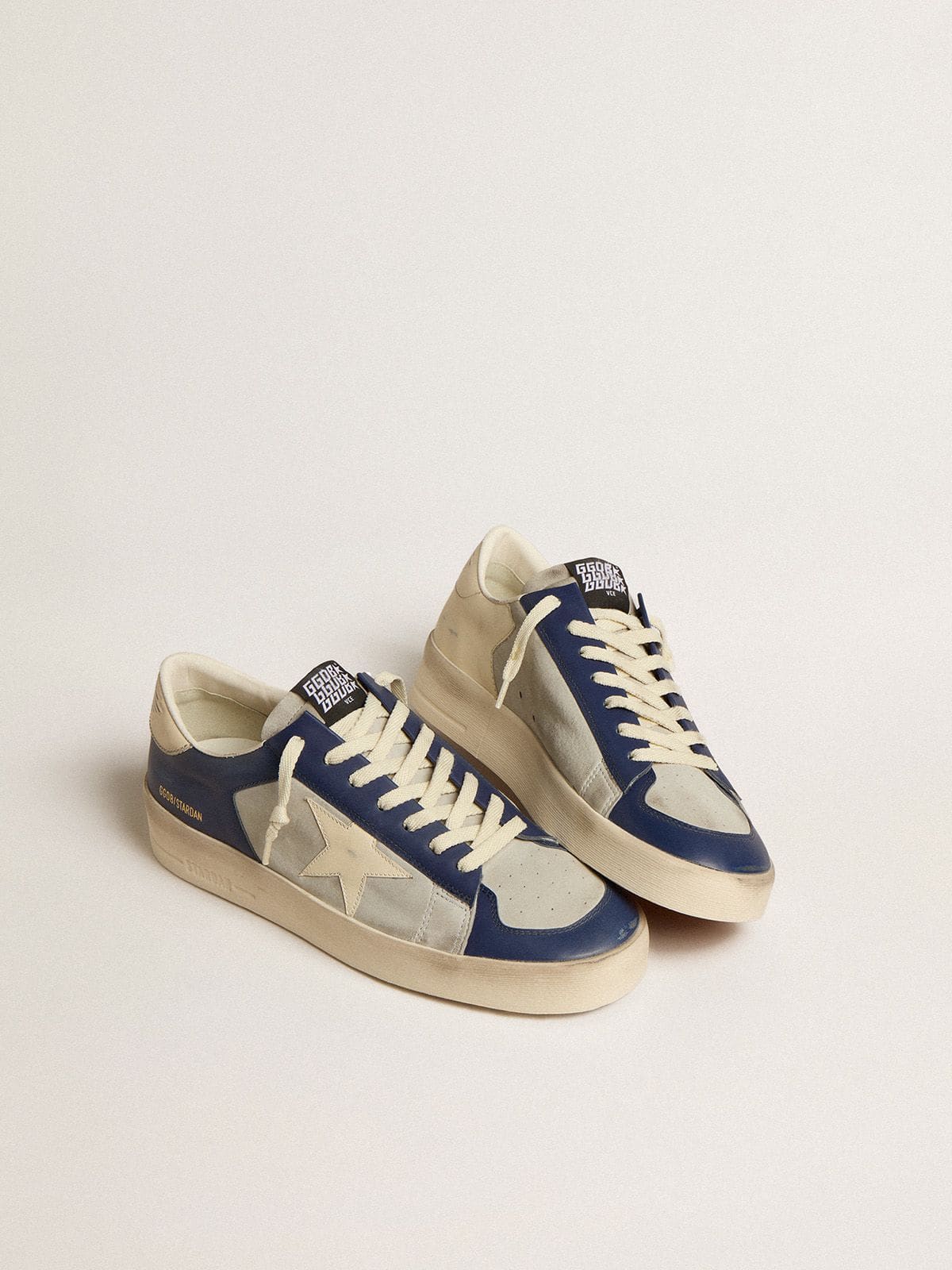 Men’s Stardan in grey and blue leather with cream-colored star and heel tab