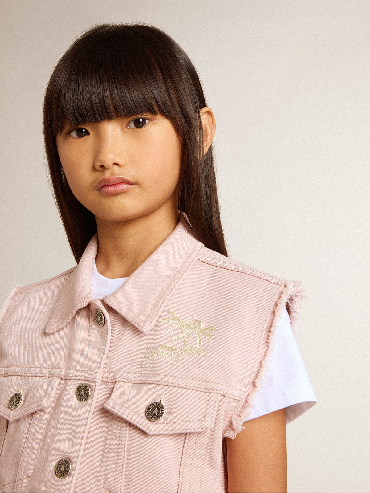 Girls' pink denim vest