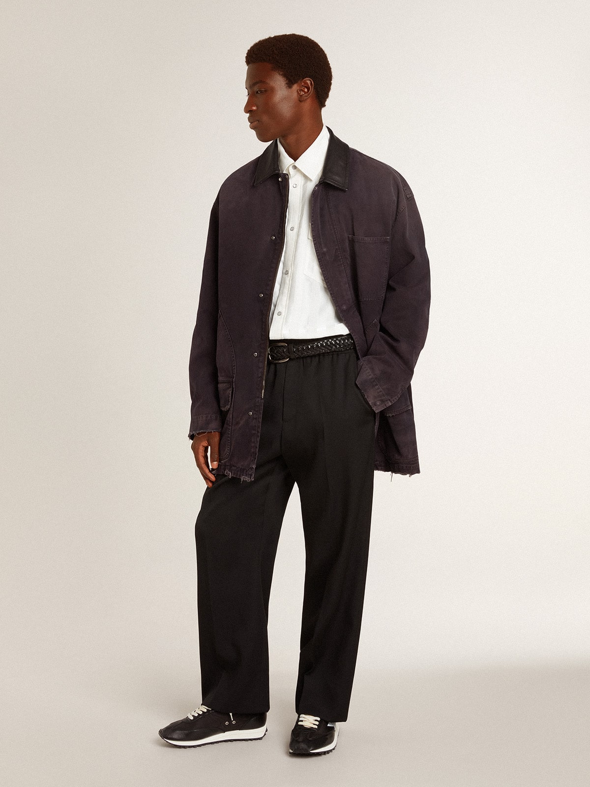 Men's denim jacket with distressed details and leather collar