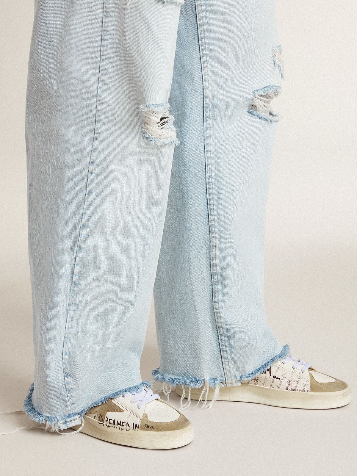 Stardan in leather with all-over lettering and ice-gray suede star