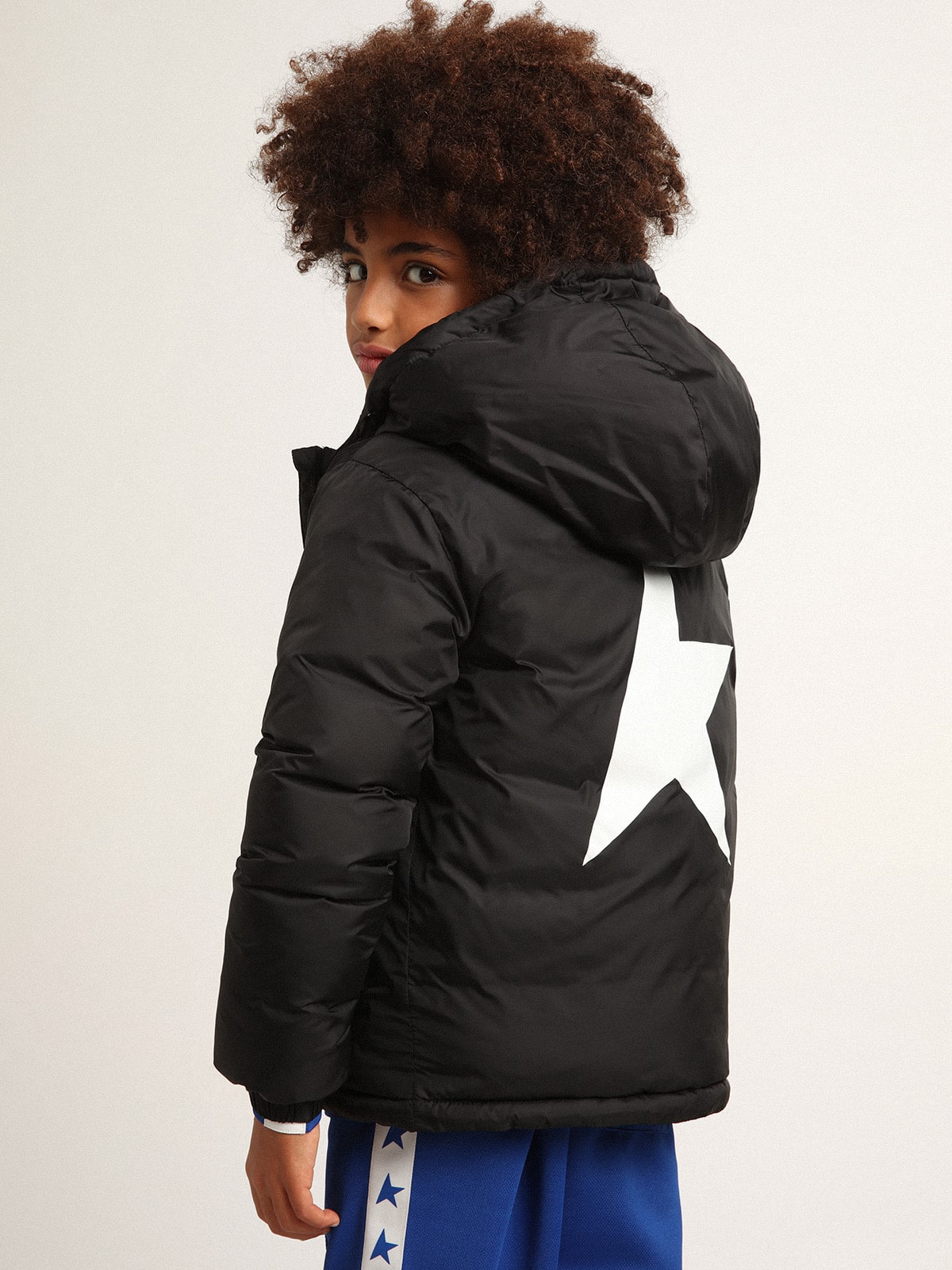 Black jacket with hood and maxi star on the back