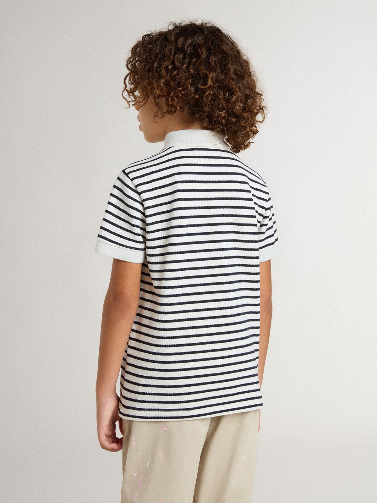 Boys' white cotton polo with navy blue stripes and embroidery