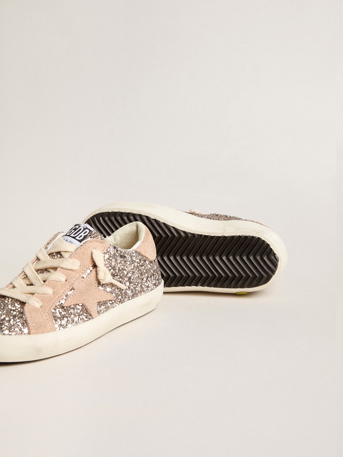 Junior Super-Star in glitter with suede star and heel tab
