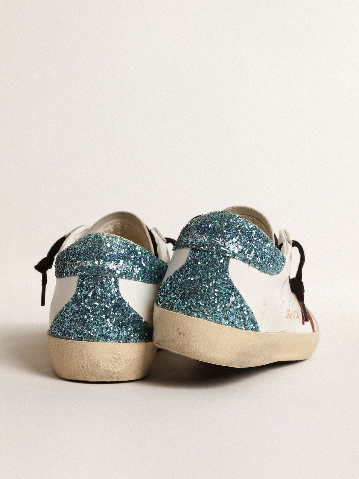 Women’s Super-Star with burgundy suede star and light blue glitter heel tab