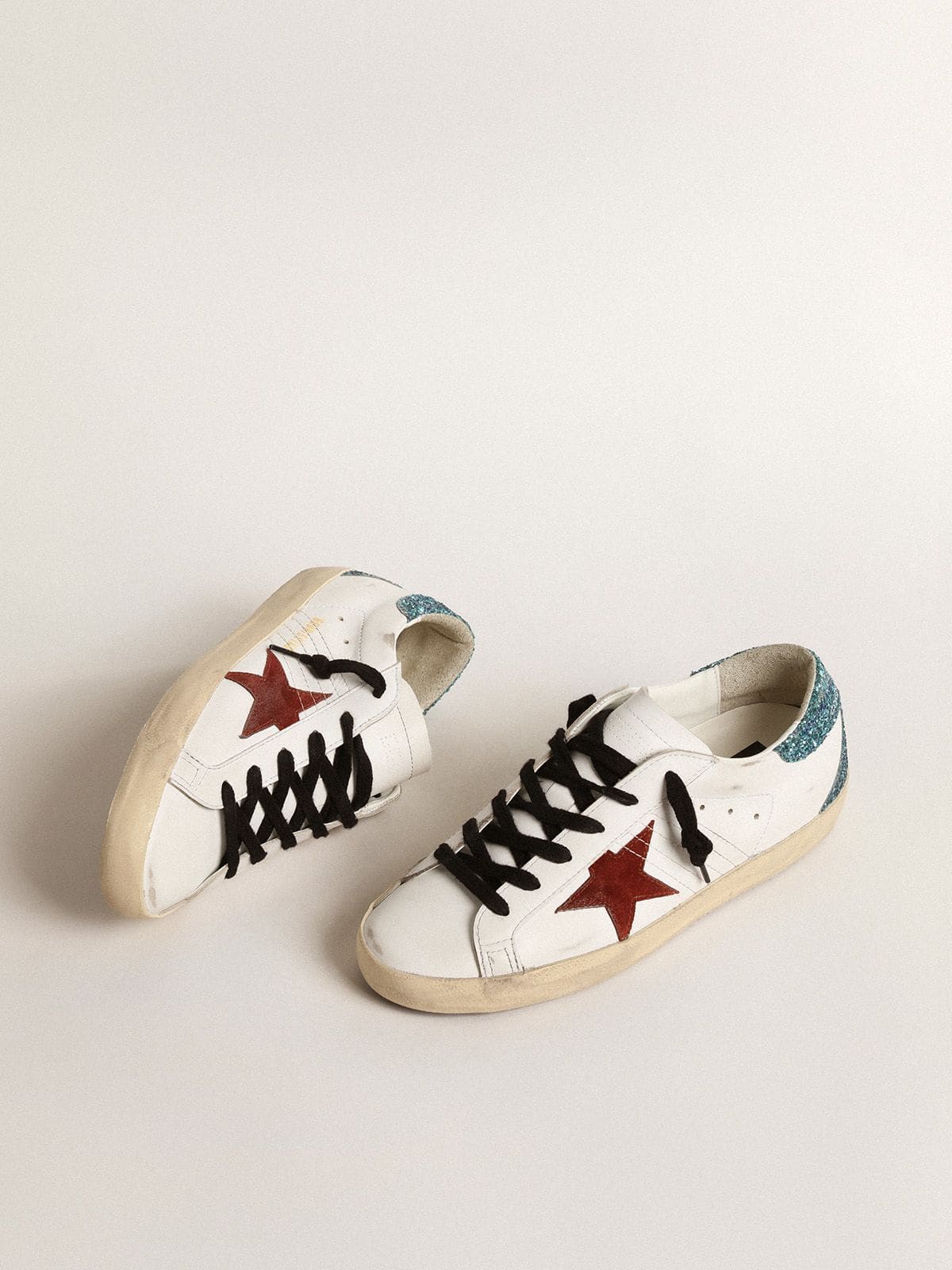 Women’s Super-Star with burgundy suede star and light blue glitter heel tab