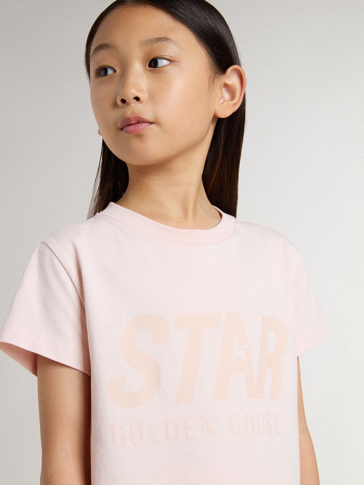Girls' pink T-shirt with pink print on the front