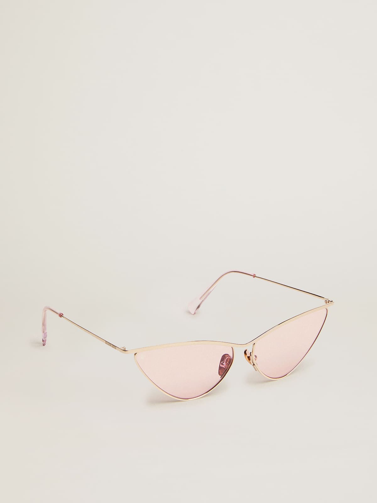Sunframe cat-eye style with pink frame and lenses
