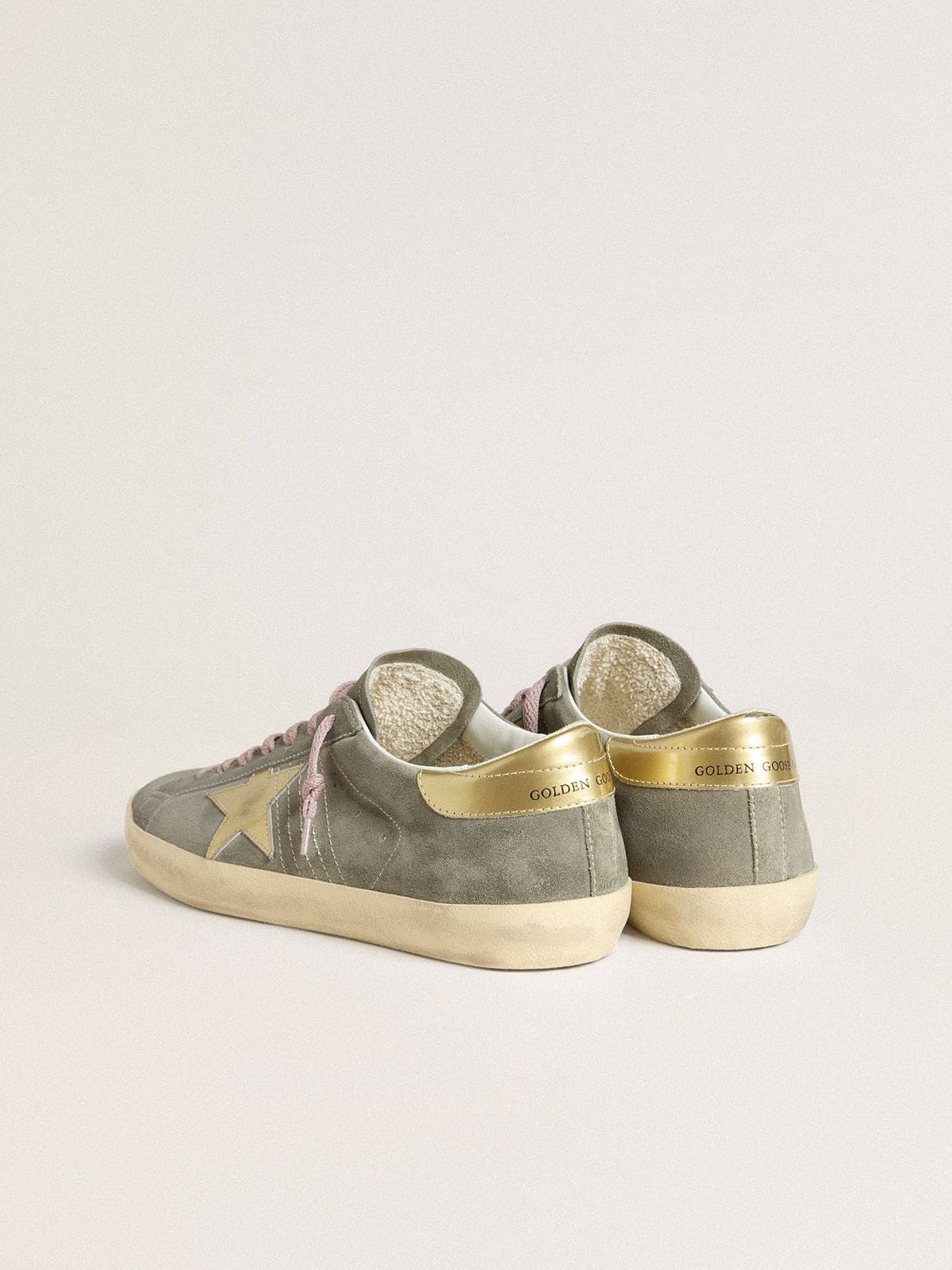 Men's Super-Star in gray suede with gold metallic leather star and heel tab